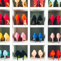 colored high heels on white shelf - fashion stock pictures, royalty-free photos & images
