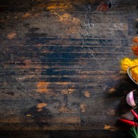colored spices and herbs border on dark table - food stock pictures, royalty-free photos & images