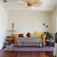 colorful cushions are arranged on a couch in a living room - home decoration stock pictures, royalty-free photos & images