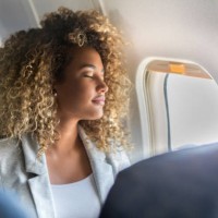 commercial airline passenger sleeps in window seat - travel stock pictures, royalty-free photos & images