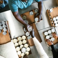 community care at local food bank - food stock pictures, royalty-free photos & images