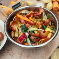 compost bin with vegetables leftovers at an open kitchen outdoors at back yard. sustainable lifestyle and zero waste cooking concept. - food stock pictures, royalty-free photos & images