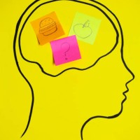 concept art of thoughts inside someones head, trying to decide of what is good. - junk food stock pictures, royalty-free photos & images