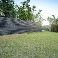 concrete wall and lawn - garden decoration stock pictures, royalty-free photos & images