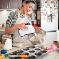 confectioner woman making delicious cream for cupcakes - food stock pictures, royalty-free photos & images