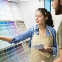 confident hardware store salesperson assisting customer - home decoration stock pictures, royalty-free photos & images