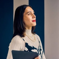 confident transgender woman in an office setting, holding a tablet. empowerment and professional growth in business concept. - fashion stock pictures, royalty-free photos & images