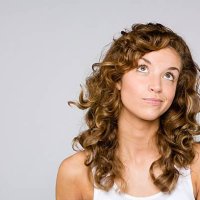 confused looking woman - hairstyle stock pictures, royalty-free photos & images