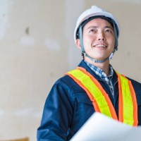 construction worker reading blueprints - home decoration stock pictures, royalty-free photos & images