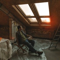 construction worker sitting on table near window in room under renovation - home decoration stock pictures, royalty-free photos & images