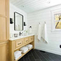 contemporary country home cabin bathroom design with vanity and linen storage - home decoration stock pictures, royalty-free photos & images