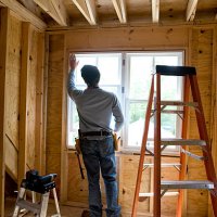 contractor working on window in new home - home decoration stock pictures, royalty-free photos & images