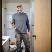 contractors working on bathroom remodel - home decoration stock pictures, royalty-free photos & images
