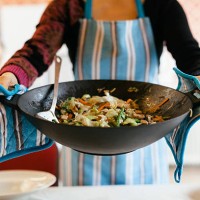 cooking wok filled with a steamy dish - food stock pictures, royalty-free photos & images