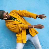 cool guy with his head on one side and his hands - fashion stock pictures, royalty-free photos & images