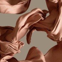 cotton fabrick flowing by wind on beige background stock photo - fashion stock pictures, royalty-free photos & images