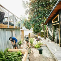 couple building garden beds in backyard on summer afternoon - home decoration stock pictures, royalty-free photos & images