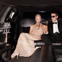 couple drinking champagne in limo - fashion stock pictures, royalty-free photos & images