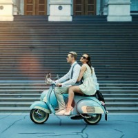 couple driving vintage scooter - fashion photos et images de collection