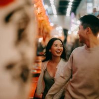 couple having fun in tokyo at night - travel stock pictures, royalty-free photos & images