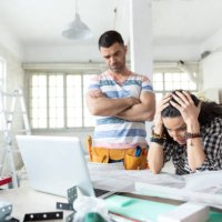 couple having problems during home renovations - home decoration stock pictures, royalty-free photos & images