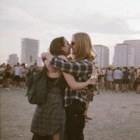 couple kissing at a festival - concert stock pictures, royalty-free photos & images