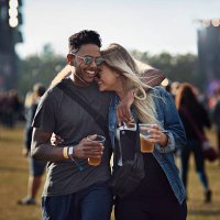 couple laughing together at concert - concert stock pictures, royalty-free photos & images