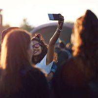 couple making selfie at big festival concert - concert stock pictures, royalty-free photos & images