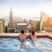 couple relaxing on hotel rooftop - travel stock pictures, royalty-free photos & images