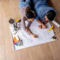 couple renovating their house and drawing a design for the furniture - home decoration stock pictures, royalty-free photos & images