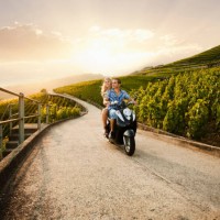 couple riding scooter in vineyard - travel stock pictures, royalty-free photos & images