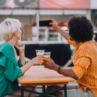 couple taking a selfie - concert stock pictures, royalty-free photos & images