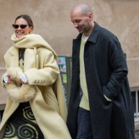 Couple Tin Vcb wears beige coat, dress, white Chanel gloves outside Lovechild 1979 during the Copenhagen Fashion Week AW24 on January 30, 2024 in...