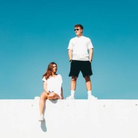 couple together concrete wall modern urban lifestyle - fashion stock pictures, royalty-free photos & images