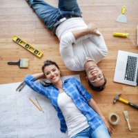 couple working on a housing project - home decoration stock pictures, royalty-free photos & images