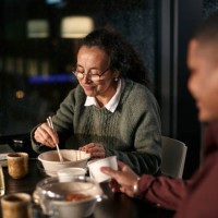 coworkers having take away - junk food stock pictures, royalty-free photos & images