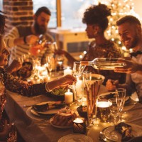 cozy new year dinner among friends - food stock pictures, royalty-free photos & images