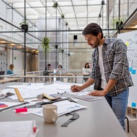 creative business man working at a coworking space - fashion stock pictures, royalty-free photos & images