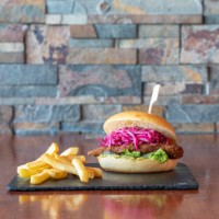 crispy chicken burger with french fries on a terrace table - junk food stock pictures, royalty-free photos & images