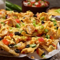 crispy chicken tender nachos - junk food stock pictures, royalty-free photos & images