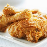 crispy fried breast and legs from chicken - junk food stock pictures, royalty-free photos & images