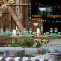 crockeries arranged on table against barn during dinner party - home decoration stock pictures, royalty-free photos & images