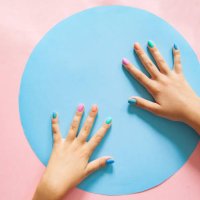 crop woman showing colorful nails in studio - nails art stock pictures, royalty-free photos & images