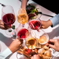 cropped hands of executives toasting wineglasses - food stock pictures, royalty-free photos & images