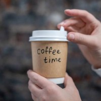 cropped hands of person holding disposable cup - junk food stock pictures, royalty-free photos & images