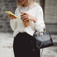 cropped image of businesswoman. midsection of a fashionable woman using smart phone and having a coffee break outdoors. - junk food stock pictures, royalty-free photos & images