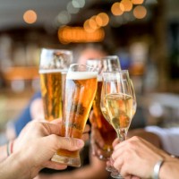 cropped image of friends toasting drinks in celebration. - food stock pictures, royalty-free photos & images