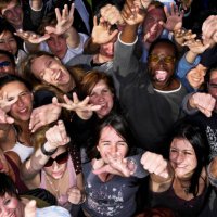 crowd of people at concert holding out hands, portrait, overhead view - concert stock pictures, royalty-free photos & images