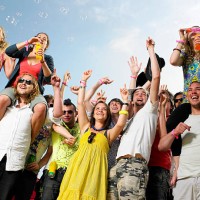 crowd of young people cheering and waving - concert stock pictures, royalty-free photos & images