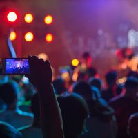 crowd using smart phone at rock concert - concert stock pictures, royalty-free photos & images